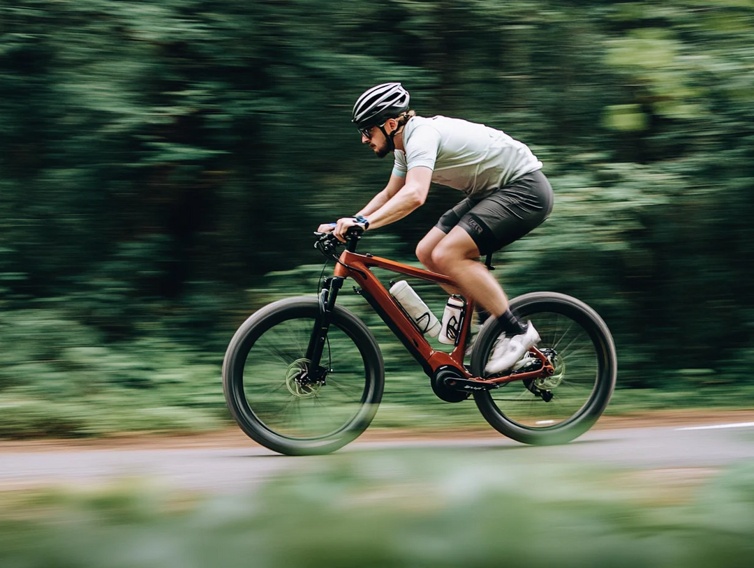 Cyclist-on-Red-Ebike-Forest-Trail